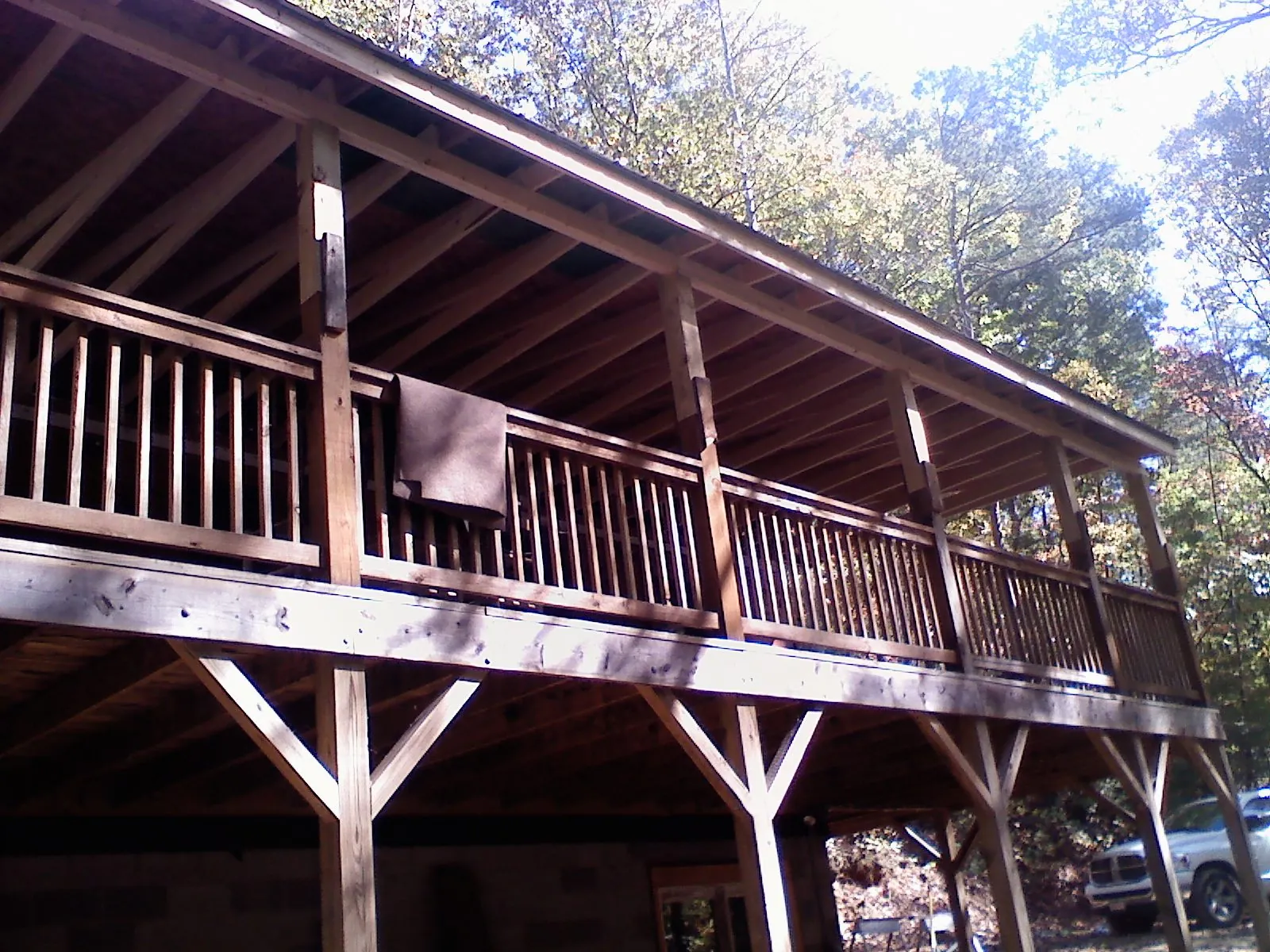 Timber framing under a new elevated porch and deck — Roof Leak Repair in East Hampstead by Roofing Brothers